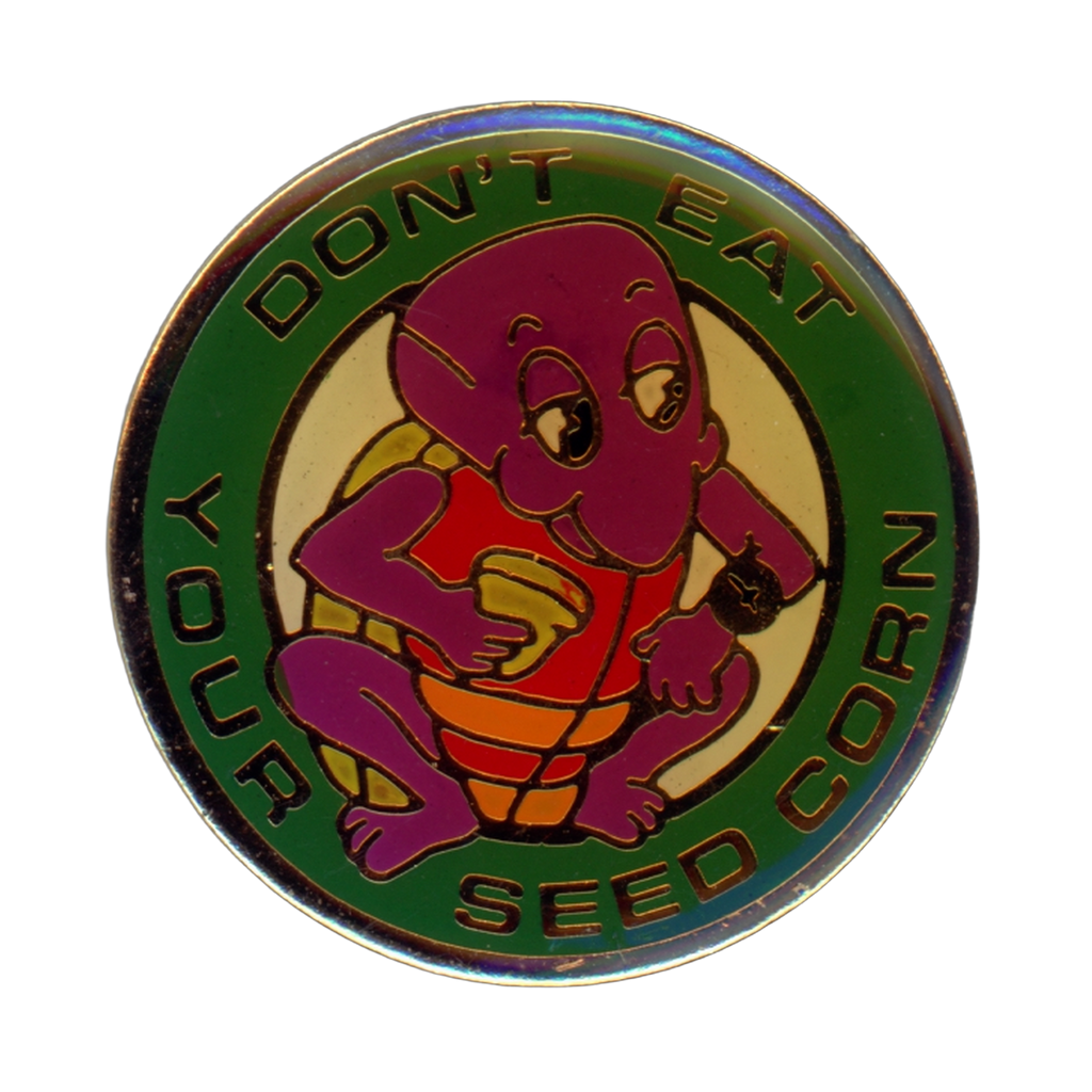 C.A. Binnell Don't Eat Your Seed Corn Turtle 1990 Lapel Pin Front